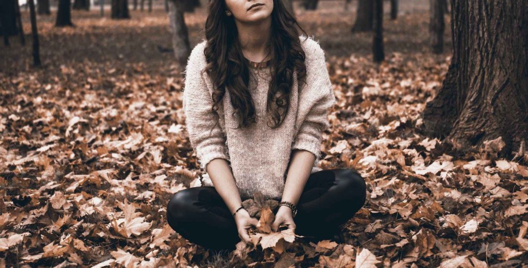 portrait of a young woman in forest